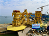 Provision of port service & seafastening Piling Template (total 2,100 tons) on Trung Nam S05 barge at Dong Xuyen Port
